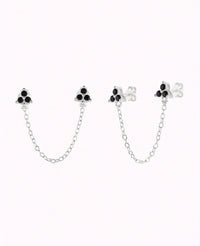 Doppelte blütenförmige Zirkonia-Piercing-Ohrstecker mit hängender Kette – erhältlich in Schwarz und Weiß