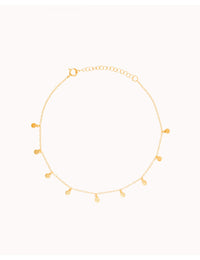 Pulsera tobillera con colgantes en forma de monedas