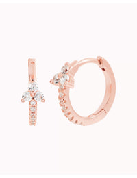Boucles d'oreilles créoles en forme de fleur avec zircones cubiques serties en pavé