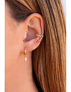 Pendientes de aro huggie con charm de circonita en talla baguette