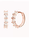 Boucles d'oreilles créoles Huggie avec zircones cubiques taille baguette