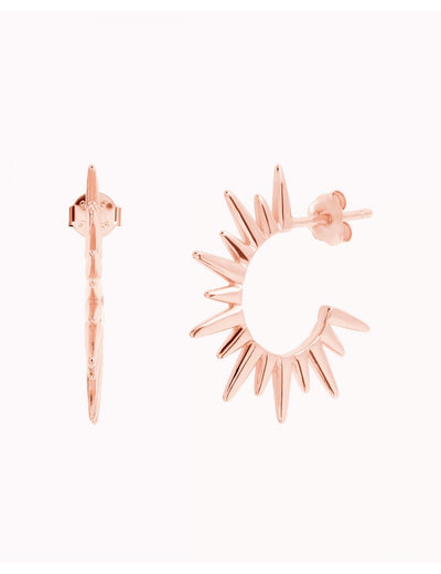 Pendientes de aro grandes con pinchos en forma de sol