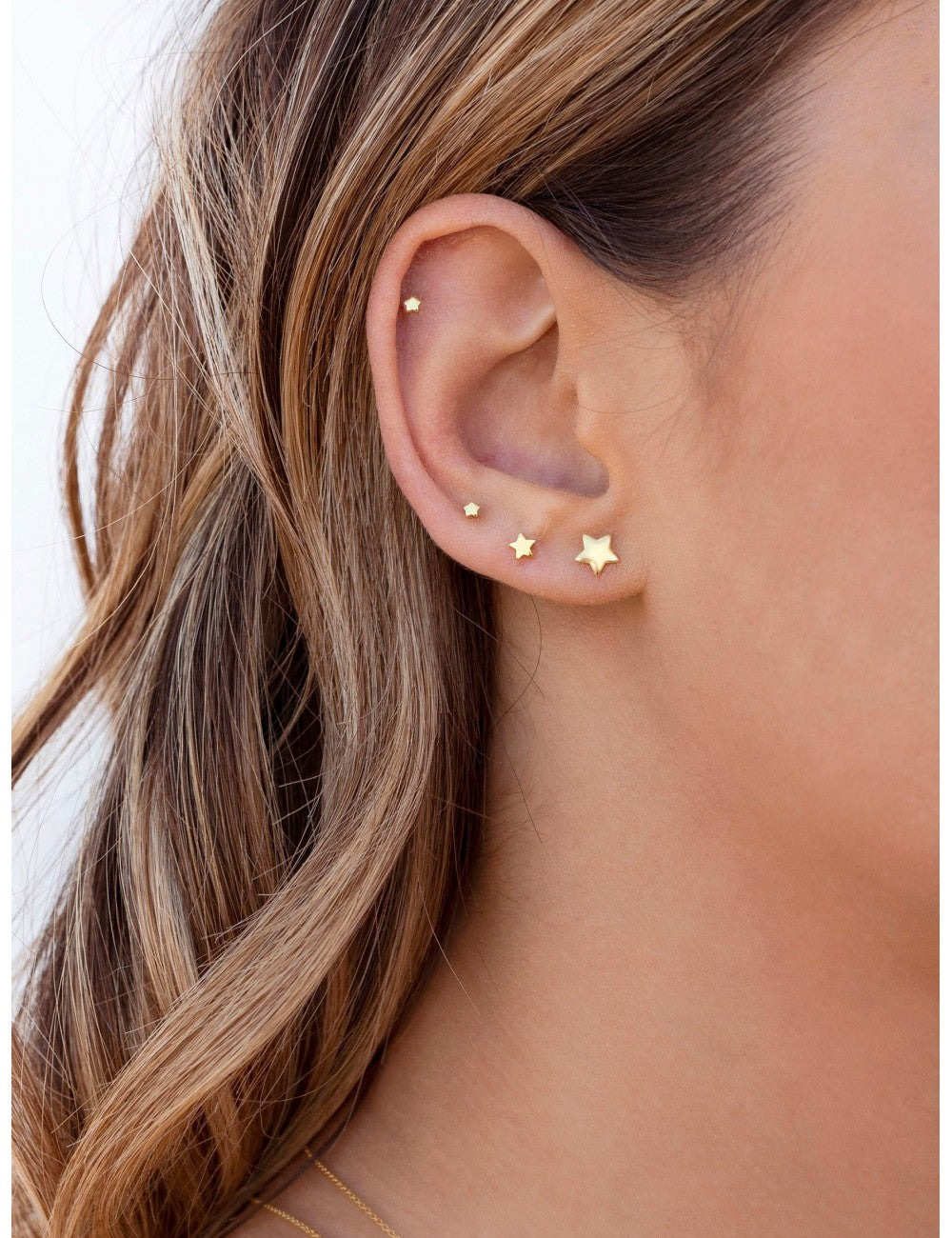 Pendientes stud minimalistas en forma de estrella - Tamaño mediano
