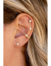 Boucles d'oreilles à tige avec chaîne suspendue et zircons taille ronde sertis en lunette